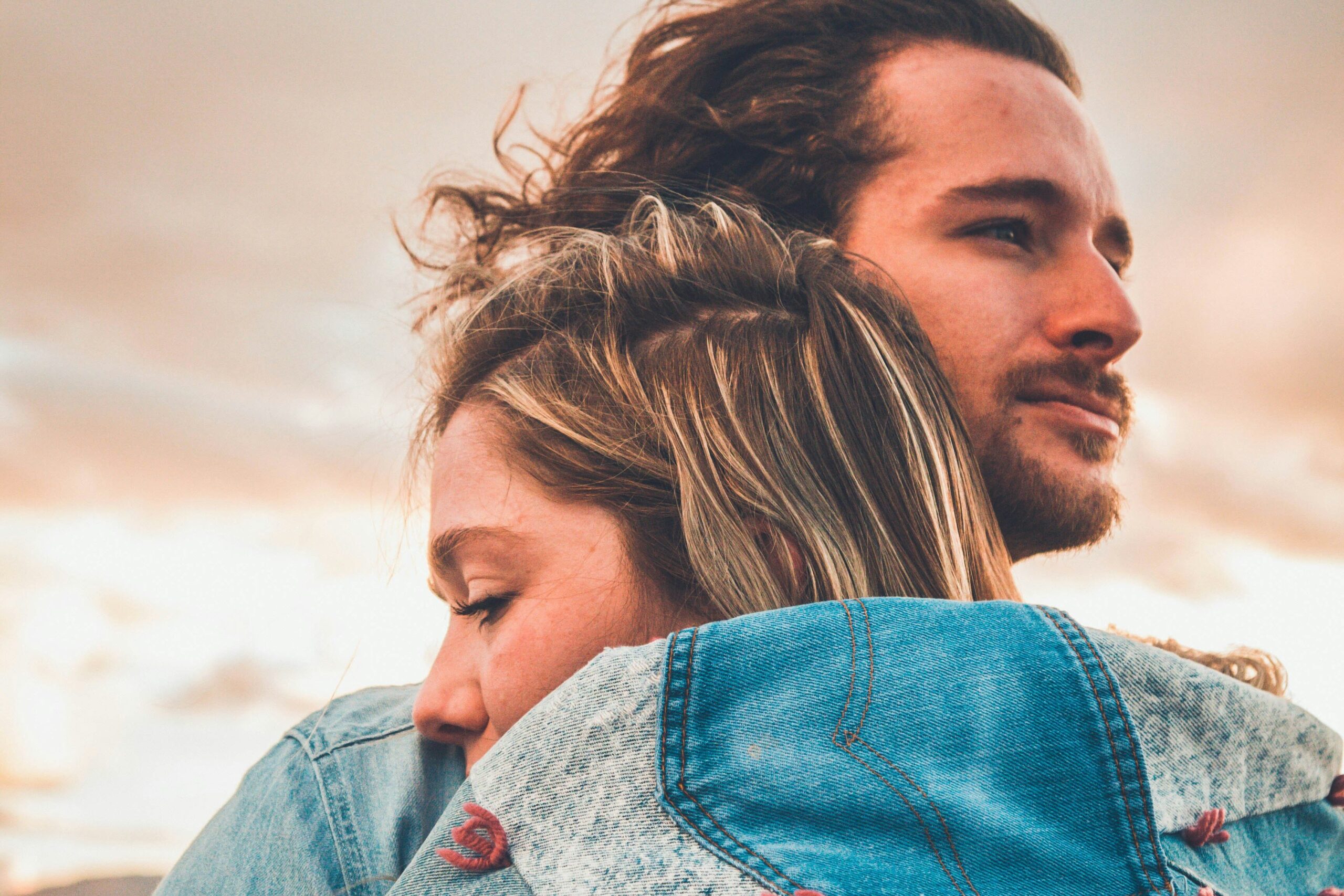 a man and woman hugging